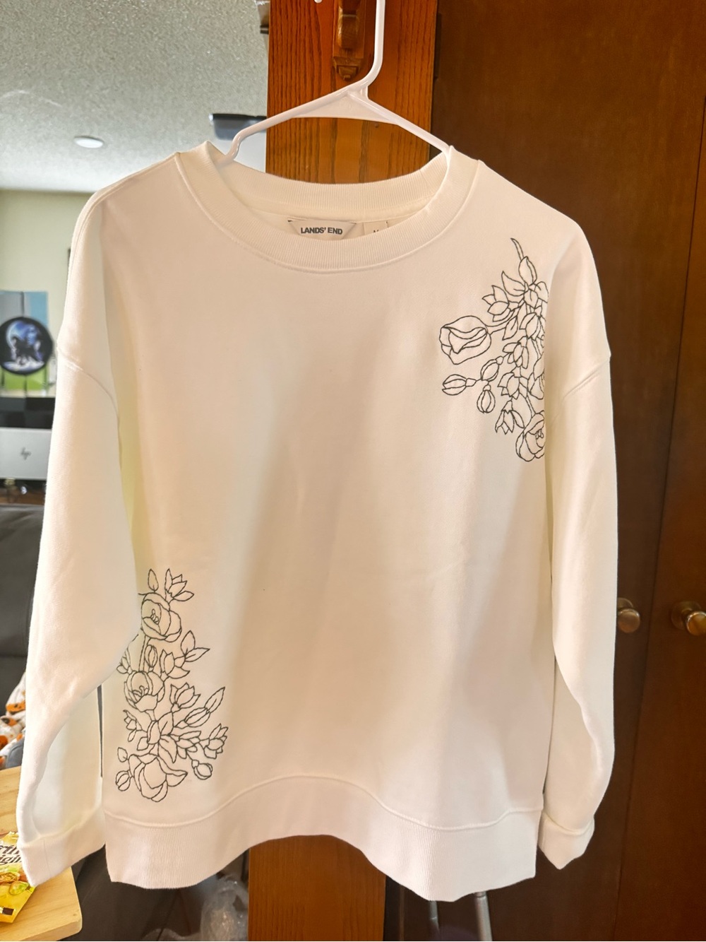 Lands' End White Crewneck Sweatshirt with Black Floral line embroidery.